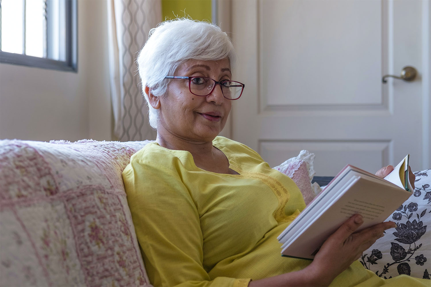 older lady reading a book